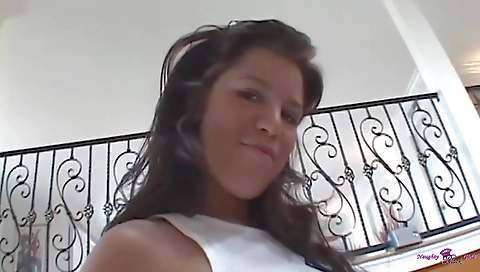 Sexy young brunette shows off her cute body